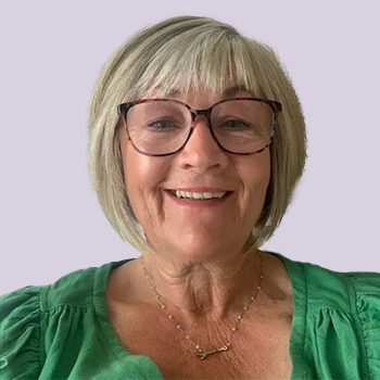 smiling woman with glasses