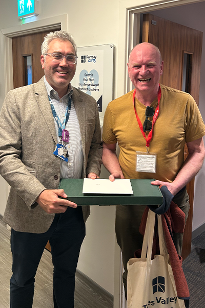 two men smiling