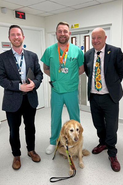 three men in hospital theatre