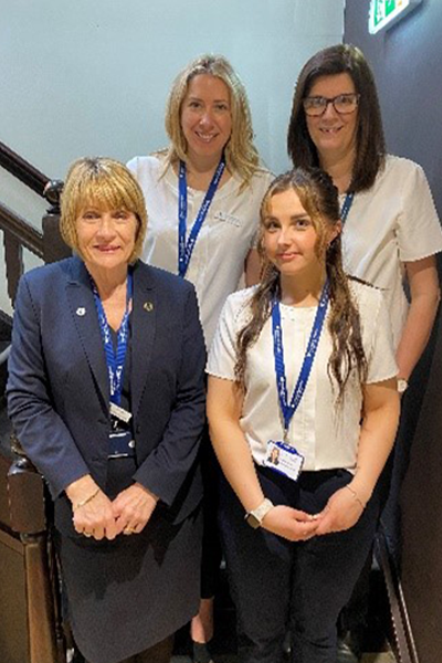 group of smiling hospital administrators