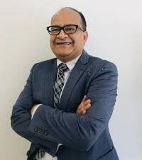 consultant in suit smiling