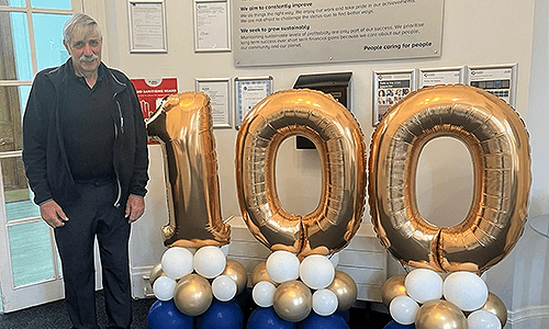 patient smiling with balloons