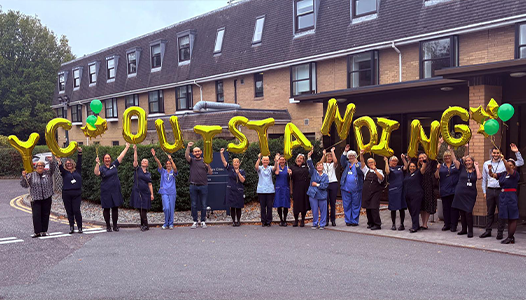 group of people with balloons